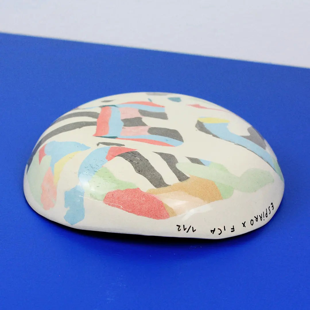 Hand-built decorative ceramic plate with organic, abstract forms and colourful details, made from earthenware and coloured earthenware, finished with a glossy transparent glaze. Created by artist Cíntia Coutinho, also known as Espirro.