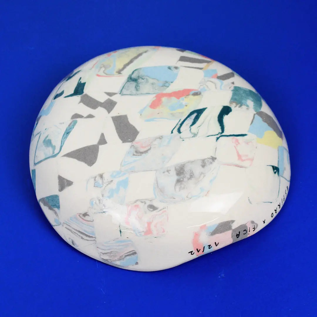 Hand-built decorative ceramic deep plate with organic, abstract forms and colourful details, made from earthenware and coloured earthenware, finished with a glossy transparent glaze. Created by artist Cíntia Coutinho, also known as Espirro.