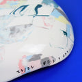 Hand-built decorative ceramic deep plate with organic, abstract forms and colourful details, made from earthenware and coloured earthenware, finished with a glossy transparent glaze. Created by artist Cíntia Coutinho, also known as Espirro.