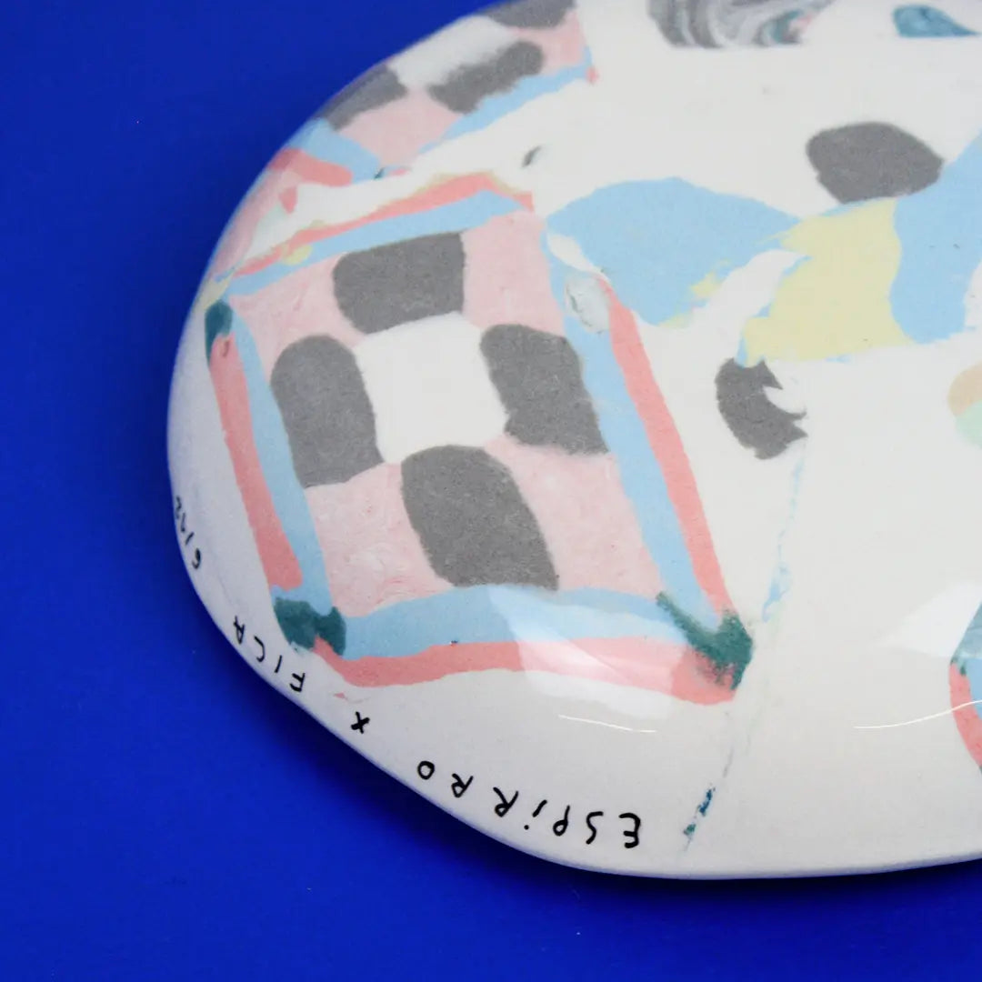 Hand-built decorative ceramic deep plate with organic, abstract forms and colourful details, made from earthenware and coloured earthenware, finished with a glossy transparent glaze. Created by artist Cíntia Coutinho, also known as Espirro.