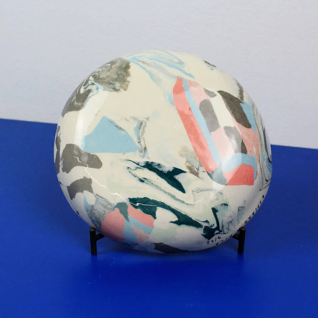 Hand-built decorative ceramic deep plate with organic, abstract forms and colourful details, made from earthenware and coloured earthenware, finished with a glossy transparent glaze. Created by artist Cíntia Coutinho, also known as Espirro.