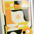 Detail of a screen-printed tile with an Artwork from Luís Silva, with a reflection light, on a stand against a gray background